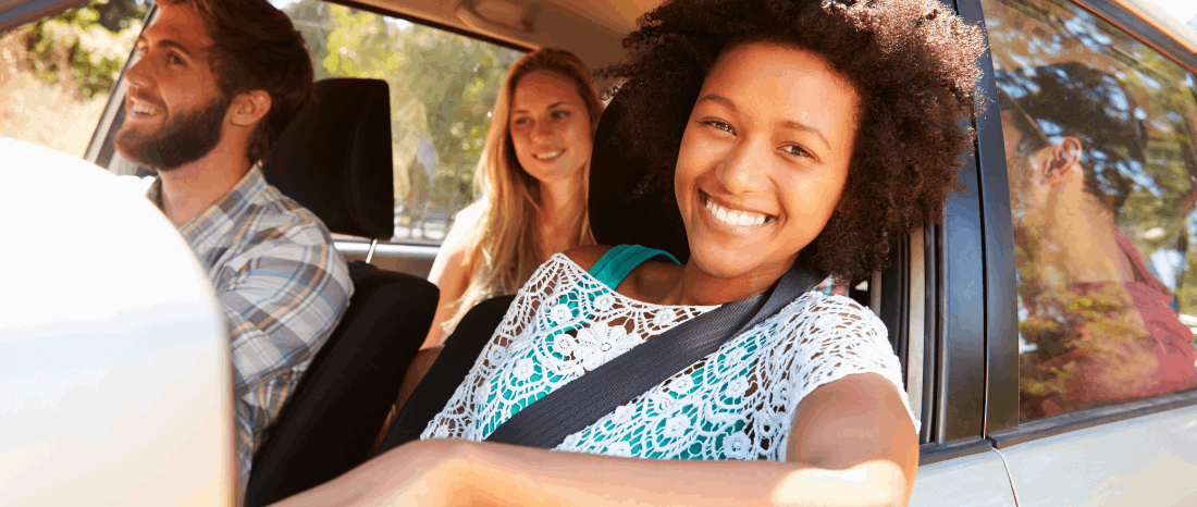 friends in car smiling image