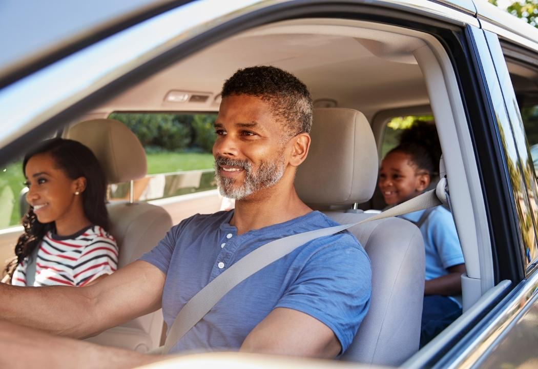 family in car